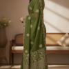 Elegant Olive Green Georgette Saree with Golden Zari Embroidery and Intricate Border