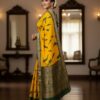 Vibrant Mustard Yellow Art Silk Saree with Green Abstract Print & Zari Border