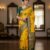 Vibrant Mustard Yellow Art Silk Saree with Green Abstract Print & Zari Border
